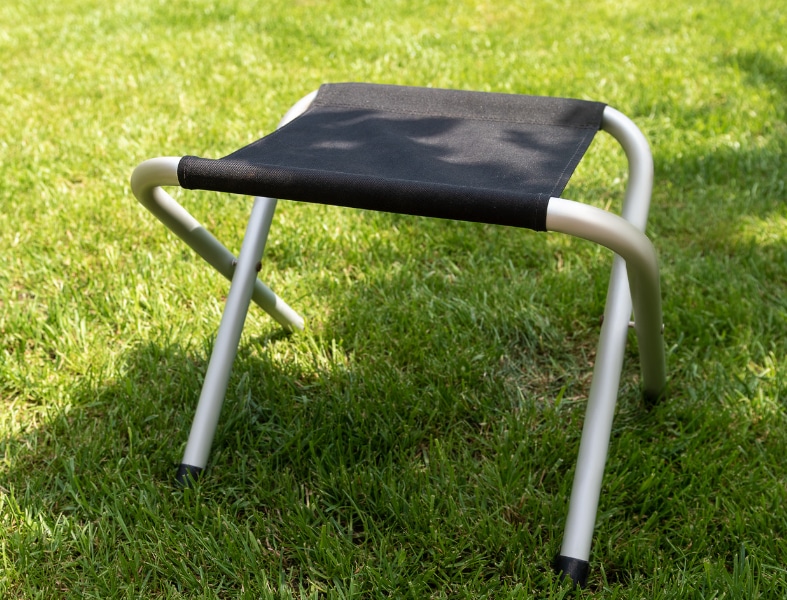 Low-profile camping chairs